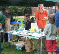 Photograph of people enjoying the Trails and Tales Bug Club event at Osterley Park
